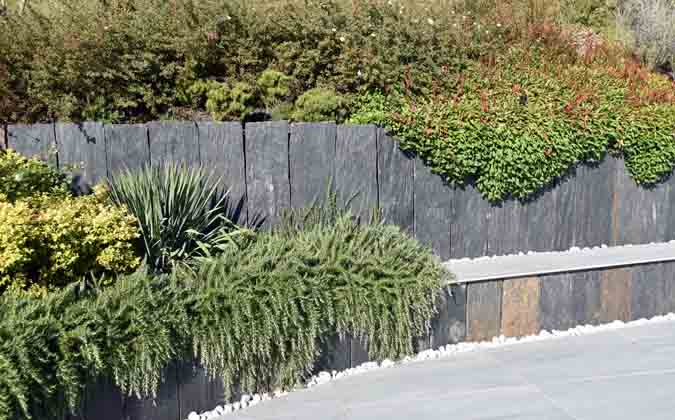 Bank and resting benches slate walls